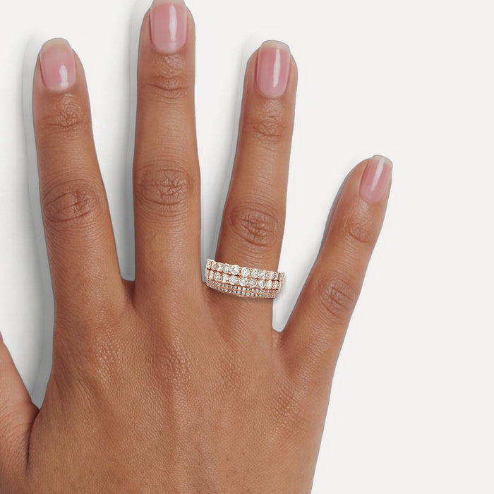 Nearly Flawless Colorless Four Row Diamond Ring (1 ¾ ct.) in 14k Rose Gold shown on a hand (medium deep skin tone)