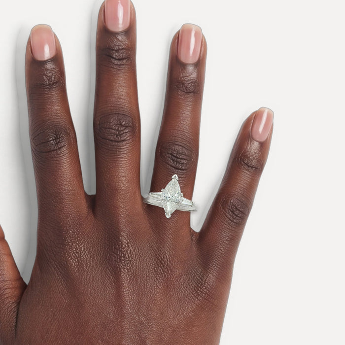 Marquise Cut Diamond & Tapered Baguette Three-Stone Ring (1 ¾ ct. tw.) in 14k White Gold shown on a hand (deep skin tone)