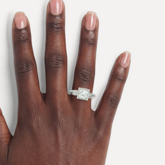 Princess Cut Halo Colorless Diamond Ring (1 ⅒ ct. tw.) in 18k White Gold shown on a hand (deep skin tone)