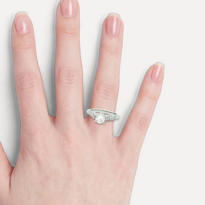 Pavé Round Brilliant Cut Near-Colorless Diamond Engagement Ring (1 ⅜ ct. tw.) in 14k White Gold shown on a hand (light skin tone)