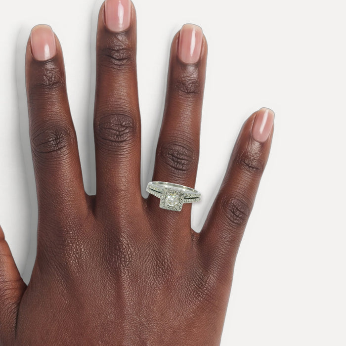 Round Brilliant Diamond Bridal Set (¾ ct. tw.) in 14k White Gold shown on a hand (deep skin tone)