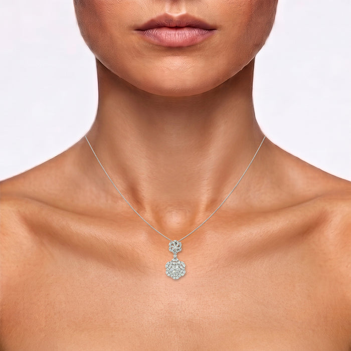 Pavé Flower Cluster Colorless Nearly Flawless Diamond Pendant Necklace (1 ⅗ ct. tw.) in 18k White Gold shown on the neck (medium skin tone)