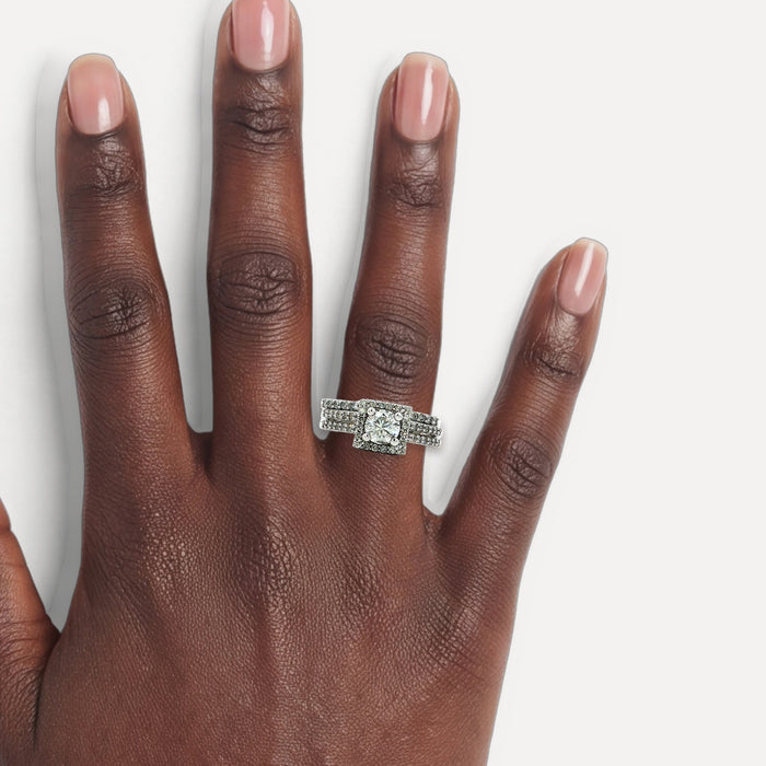 Square Halo Near-Colorless Diamond Bridal Set (1 ¼ ct. tw.) in 14k White Gold shown on a hand (deep skin tone)