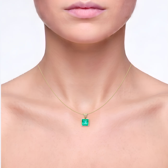 Emerald Pendant Necklace (1 ⅞ ct.) in 14k Yellow Gold shown on the neck (light skin tone)