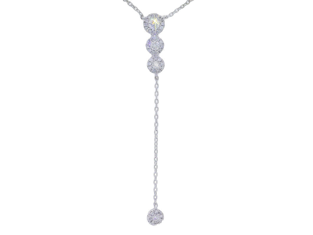 A radiant cut diamond lariat necklace with a Y-shaped silhouette, featuring a series of diamond clusters and a single drop pendant.