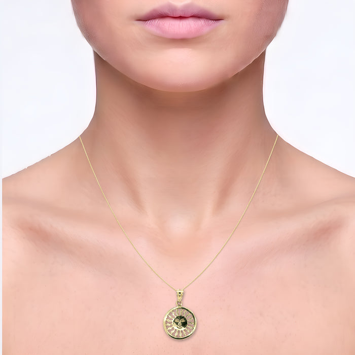 Sun Face Celestial Pendant Necklace in Solid 14k Yellow Gold shown on the neck (light skin tone)