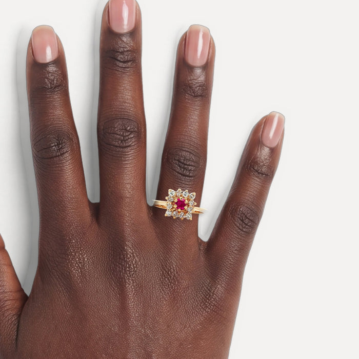 Vibrant Ruby & Nearly Flawless Colorless Diamond Ring (1 ¼ ct. tw.) in 14k Yellow Gold shown on a hand (deep skin tone)