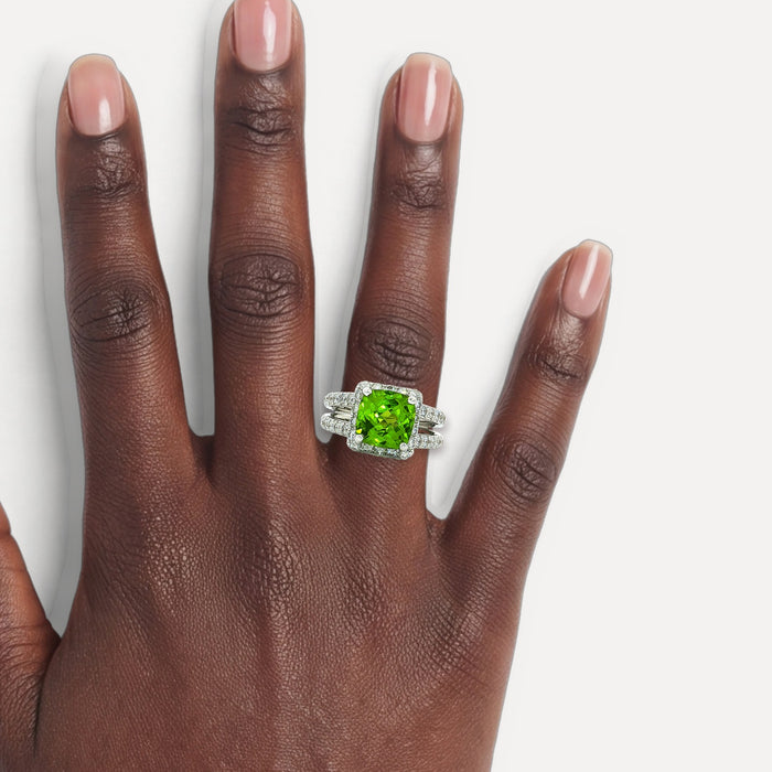 Cushion Vivid Peridot Diamond Halo Ring (4 ½ ct. tw.) in 18k White Gold shown on a hand (deep skin tone)