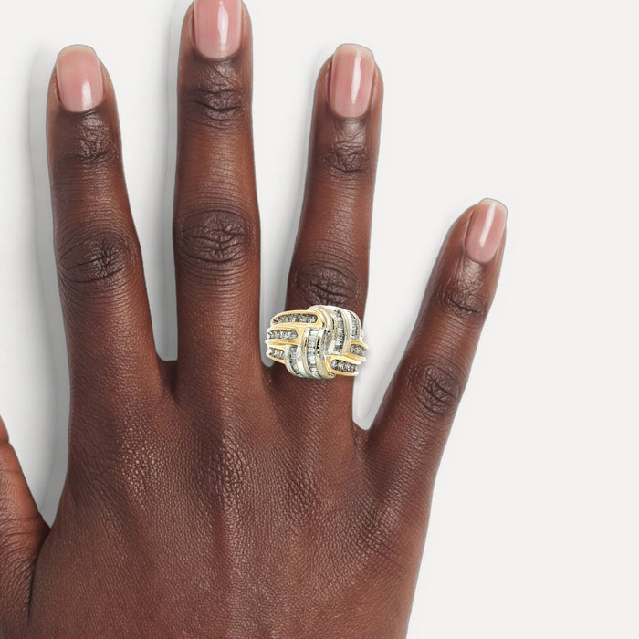 Vintage Round Brilliant Cut & Baguette Diamond Knot Ring (1 ¼ ct. tw.) with a Channel-Set Overlapping Weave Design in 14k Yellow & White Gold shown on a hand (deep skin tone)
