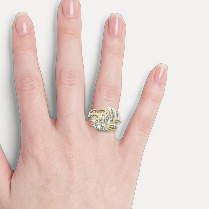 Vintage Round Brilliant Cut & Baguette Diamond Knot Ring (1 ¼ ct. tw.) with a Channel-Set Overlapping Weave Design in 14k Yellow & White Gold shown on a hand (light skin tone)