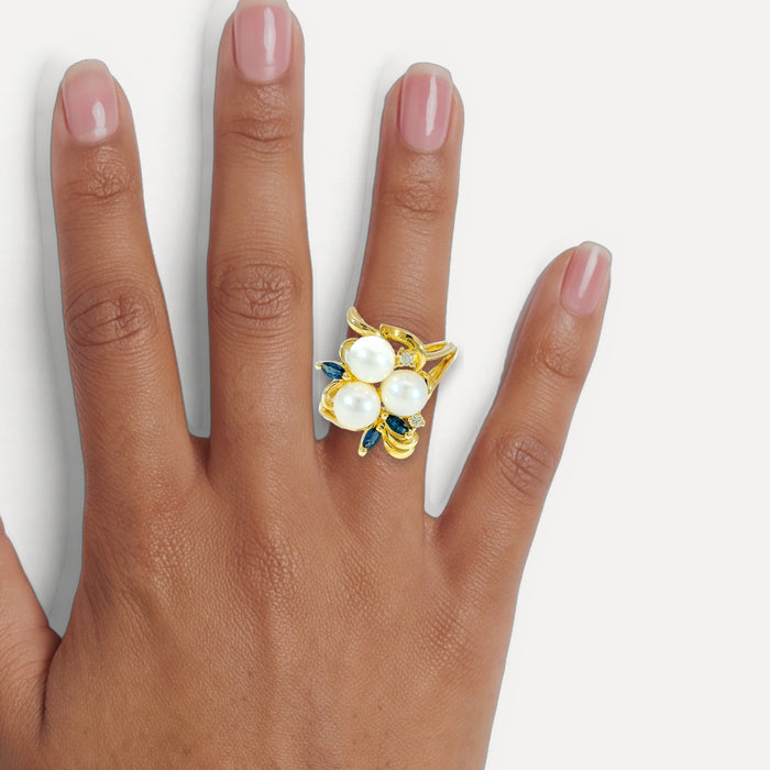Pearl, Sapphire & Diamond Cocktail Ring (⅜ ct. tw.) in 14k Yellow Gold shown on a hand (medium deep skin tone)