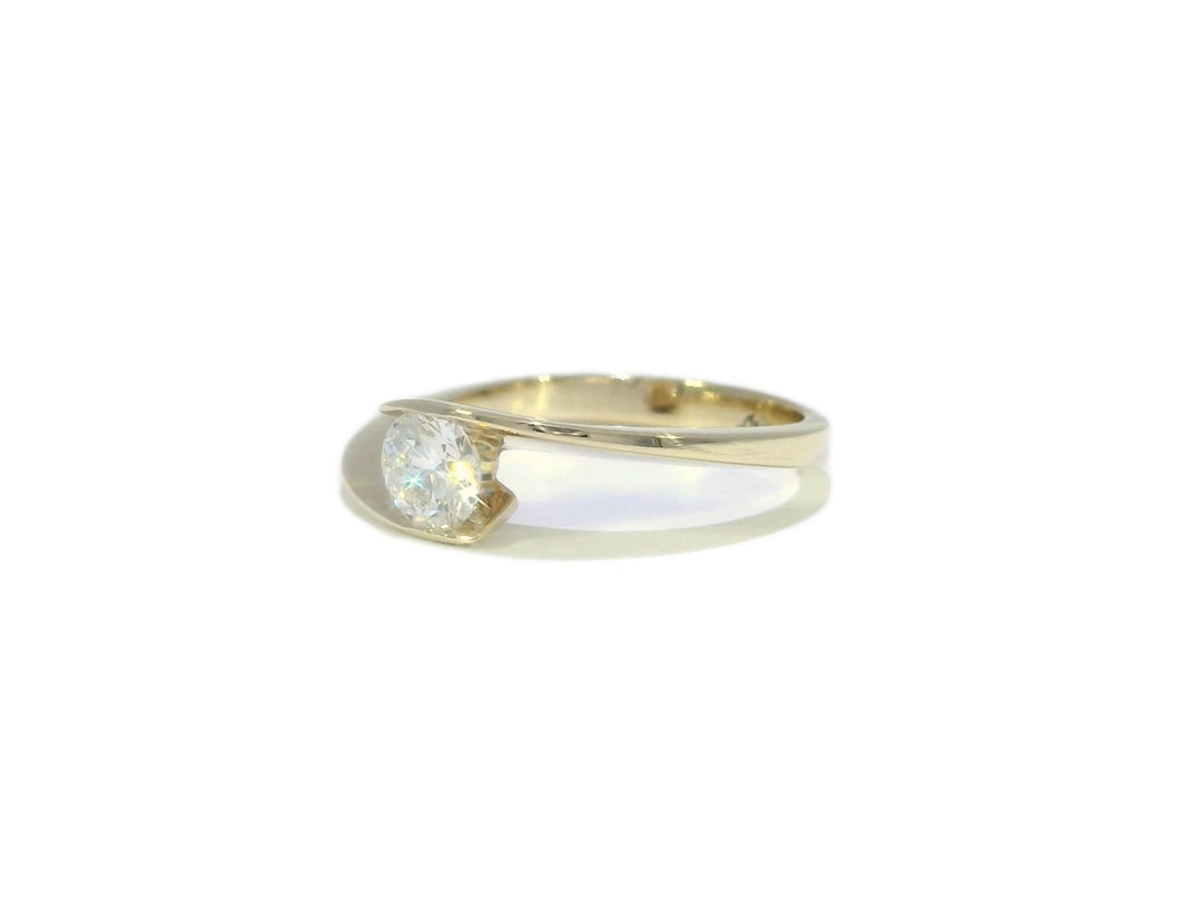 0.55 CTW Colorless VS₁ Natural Round Brilliant Diamond Ring in Yellow Gold