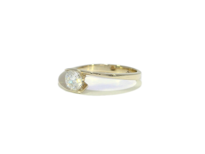 0.55 CTW Colorless VS₁ Natural Round Brilliant Diamond Ring in Yellow Gold
