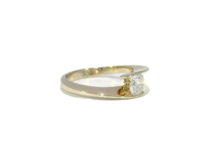 0.55 CTW Colorless VS₁ Natural Round Brilliant Diamond Ring in Yellow Gold
