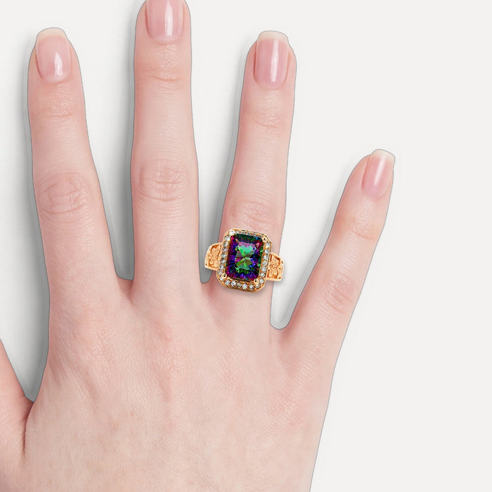 Radiant Cut Mystic Topaz Diamond Halo Ring (3 ¾ ct. tw.) in 14k Yellow Gold shown on a hand (light skin tone)