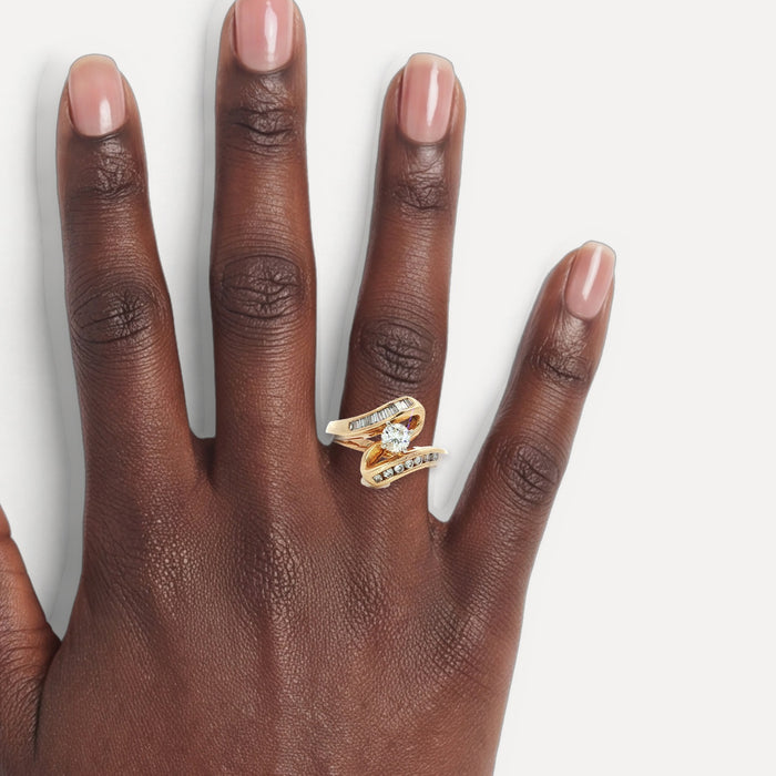 Vintage Colorless Diamond Bypass Engagement Ring (¾ ct.) in 14k Yellow Gold shown on a hand (deep skin tone)