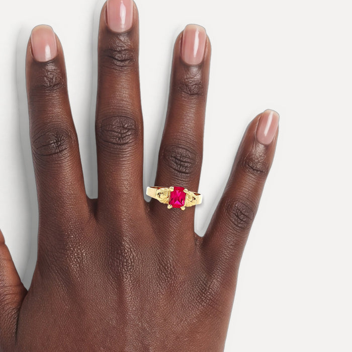 Emerald Cut Vivid Pink Spinel Ring (⅔ ct.) in 14k Yellow Gold shown on a hand (deep skin tone)