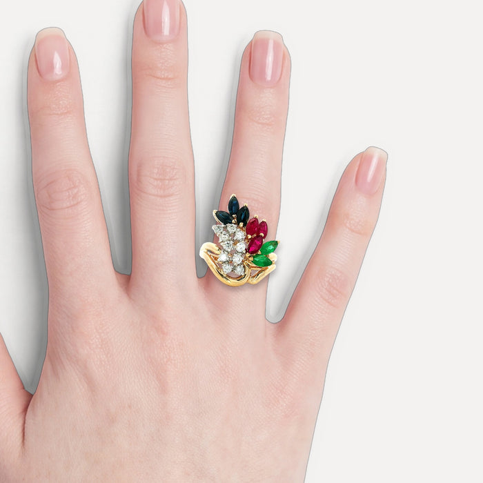 Birds of Paradise Diamond, Ruby, Sapphire & Emerald Ring (3 ⅒ ct. tw.) in 14k Yellow Gold shown on a hand (light skin tone)