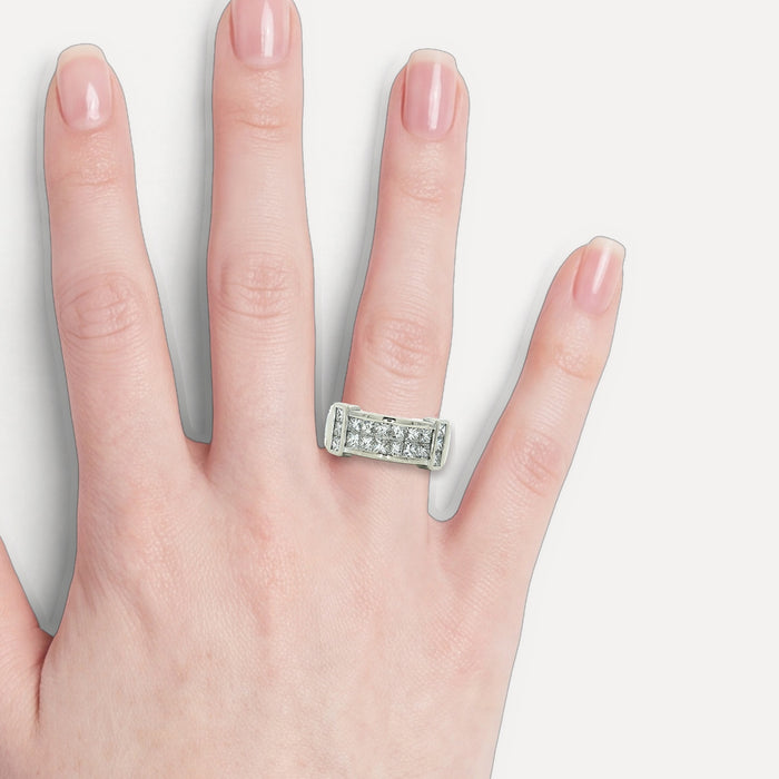 Nearly Flawless Colorless Invisibly-Set Princess Cut Diamond Multi-Band Ring (2 ½ ct. tw.) in 18k White & Yellow Gold shown on a hand (light skin tone)