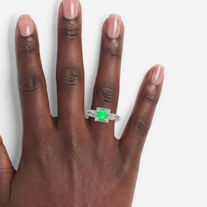 Vivid Asscher Cut Emerald Diamond Halo Ring (1 ct. tw.) in 18k White Gold shown on a hand (deep skin tone)