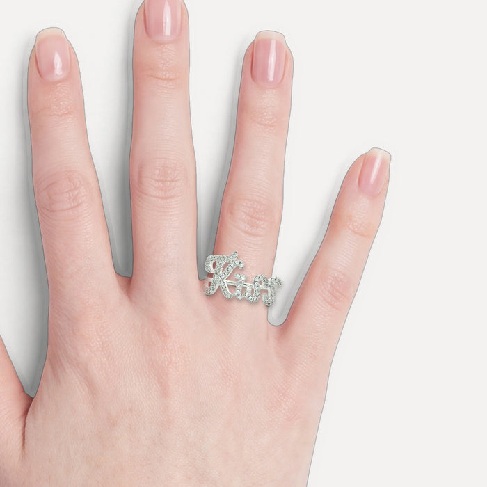 Round Brilliant Cut Near Colorless Pavé Diamond Ring (⅓ ct.) in 18k White Gold shown on a hand (light skin tone)