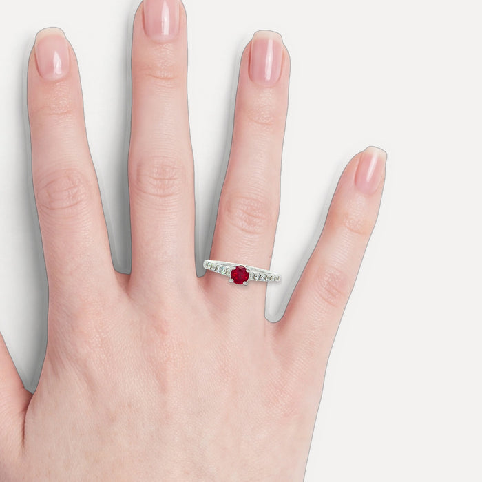 Deep Red Ruby and Nearly Flawless Diamond Ring (⅚ ct. tw.) in 14k White Gold shown on a hand (light skin tone)