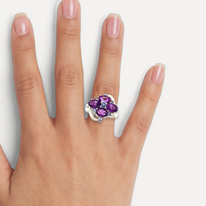 Purple & Sky Blue Split Shank CZ Ring in Sterling Silver shown on a hand (medium skin tone)