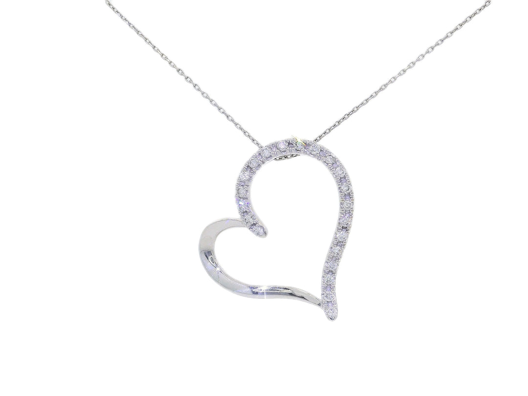 Heart-shaped diamond necklace on a white background