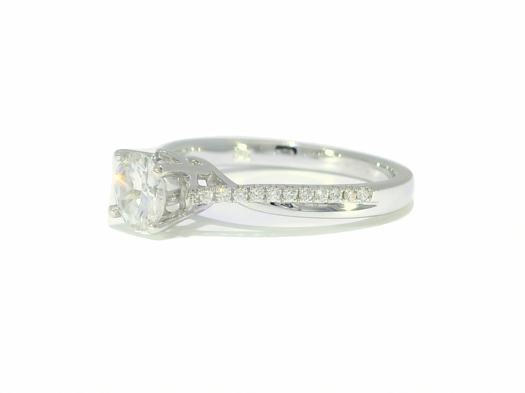0.74 CTW Colorless Round Brilliant Diamond Engagement Ring in 18KT White Gold
