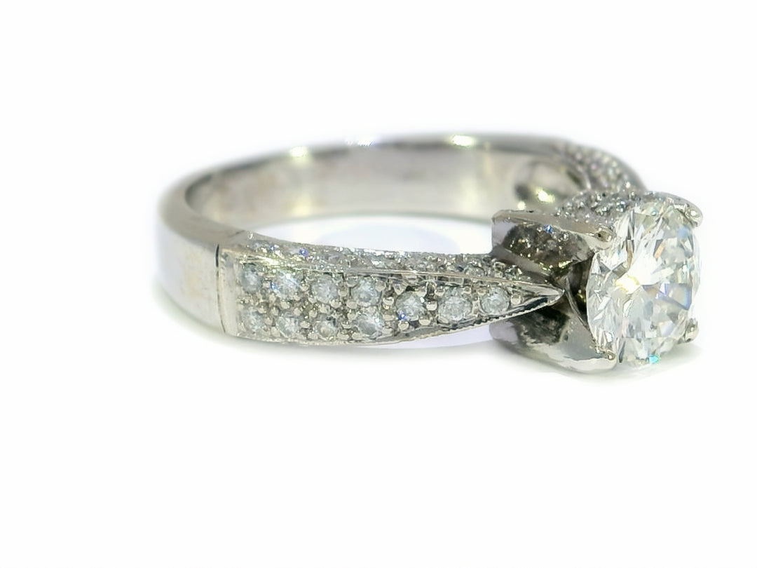 1.25 CTW Colorless Round Brilliant Diamond Engagement Ring in Pavé Mounting 14KT White Gold