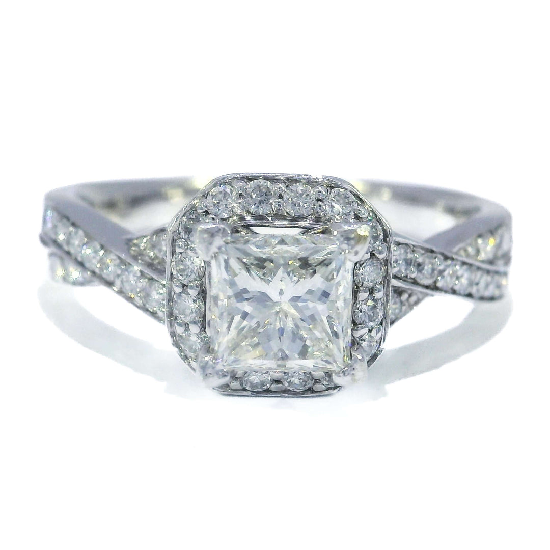Princess cut diamond engagement ring with split shank and pavé halo setting