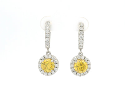 Yellow gemstone and diamond halo drop earrings in white gold setting