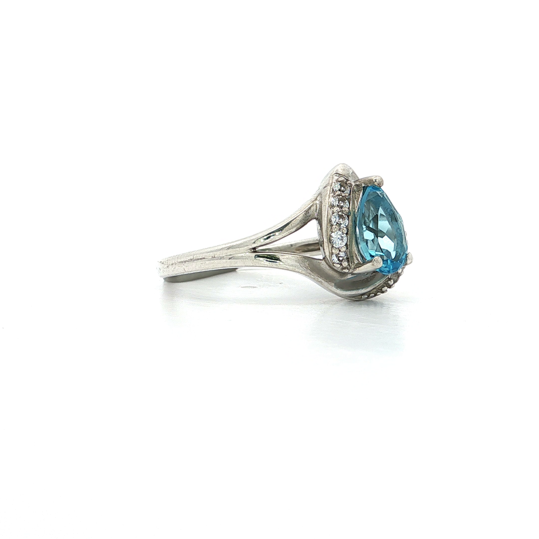 Pear Shape Aquamarine Blue CZ Halo Ring in Sterling Silver