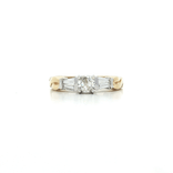 Round Brilliant Cut & Baguette Cut Diamond Ring (¾ ct. tw.) in 14k Yellow & White Gold