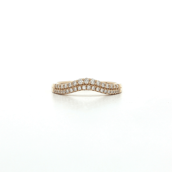 Gold ring with diamonds on a white background
