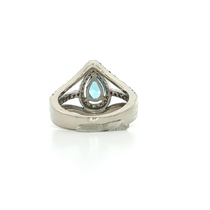 2.75 CTW AAAA-Grade Swiss Blue Pear Shaped Topaz with a Halo and Triple Split Shank of Natural Near-Colorless Round Brilliant Cut Diamonds in a 14kt White Gold Ring