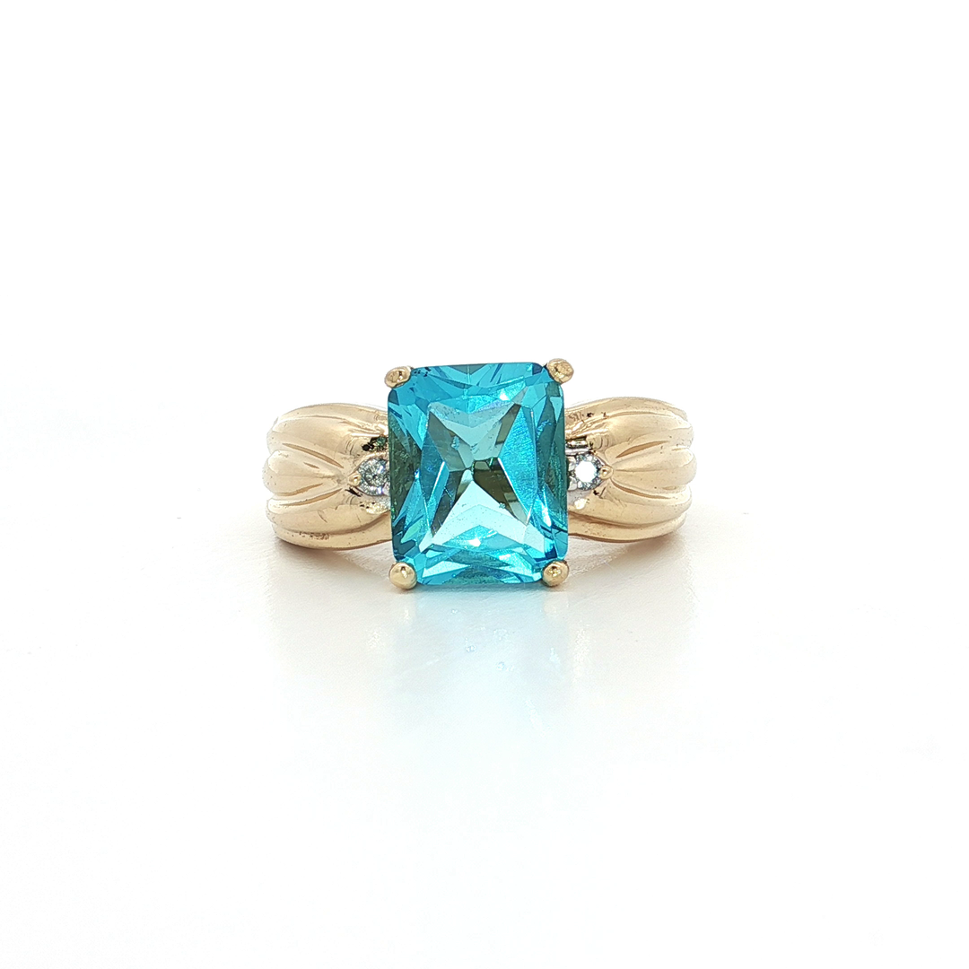 3.30 CTW AAAA Grade Blue Topaz & Natural Diamond Ring in 14kt Yellow Gold