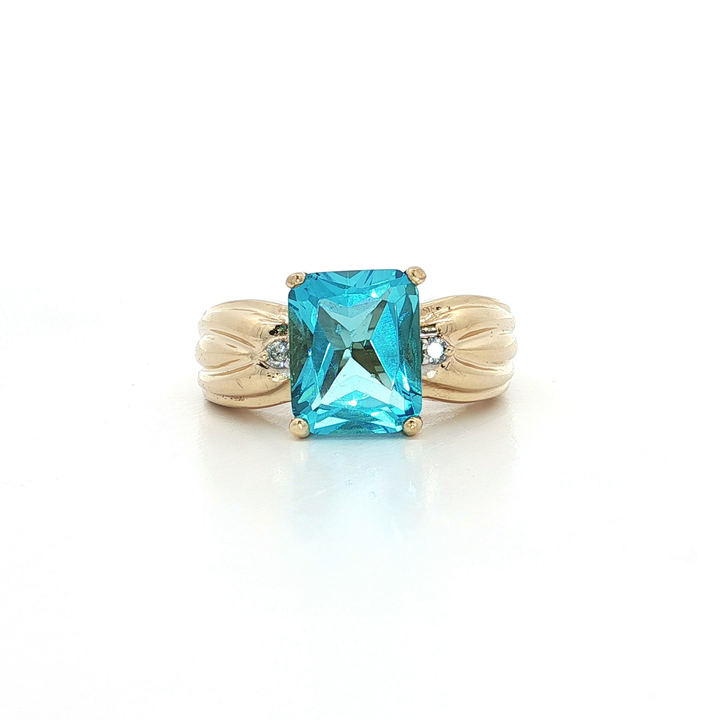 3.30 CTW AAAA Grade Blue Topaz & Natural Diamond Ring in 14kt Yellow Gold