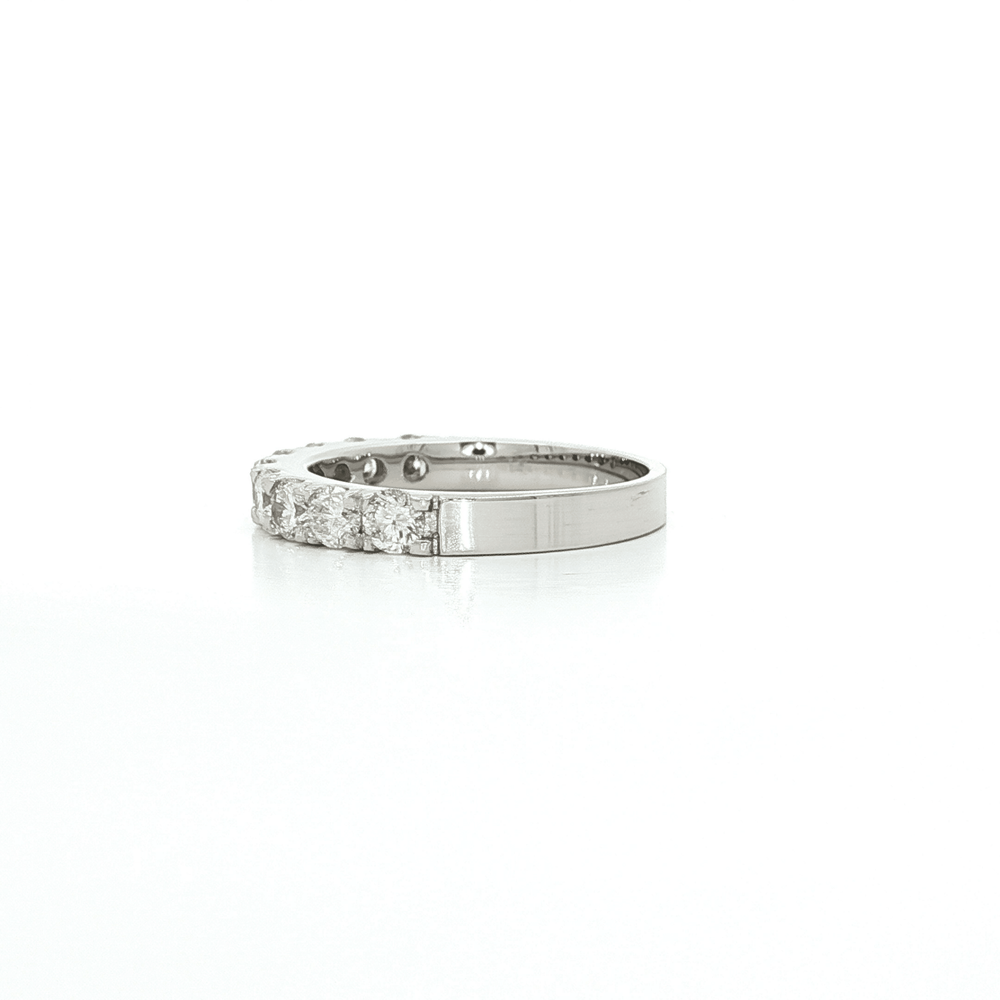 Round Brilliant Cut Colorless Diamond Wedding Band in 14k White Gold showcasing a stunning design.