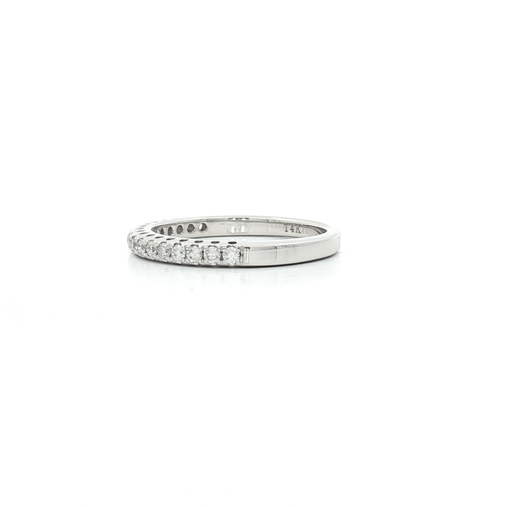 Colorless Diamond Wedding Band featuring 0.60 ct. of brilliant diamonds set in 14k white gold for elegant vows.