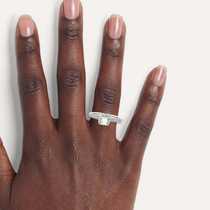 Halo Near-Colorless Emerald-Cut Diamond Engagement Ring (1 ct. tw.) in 18k White Gold shown on a hand (deep skin tone)