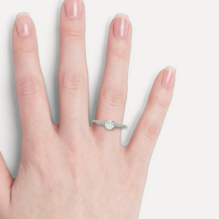 Certified Round Brilliant Cut Diamond Engagement Ring (⅞ ct.) in 18k White Gold shown on a hand (light skin tone)