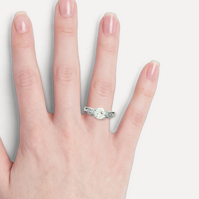GIA-Certified Round Brilliant Diamond Engagement Ring (1 ⅛ ct.) in 14k White Gold shown on a hand (light skin tone)