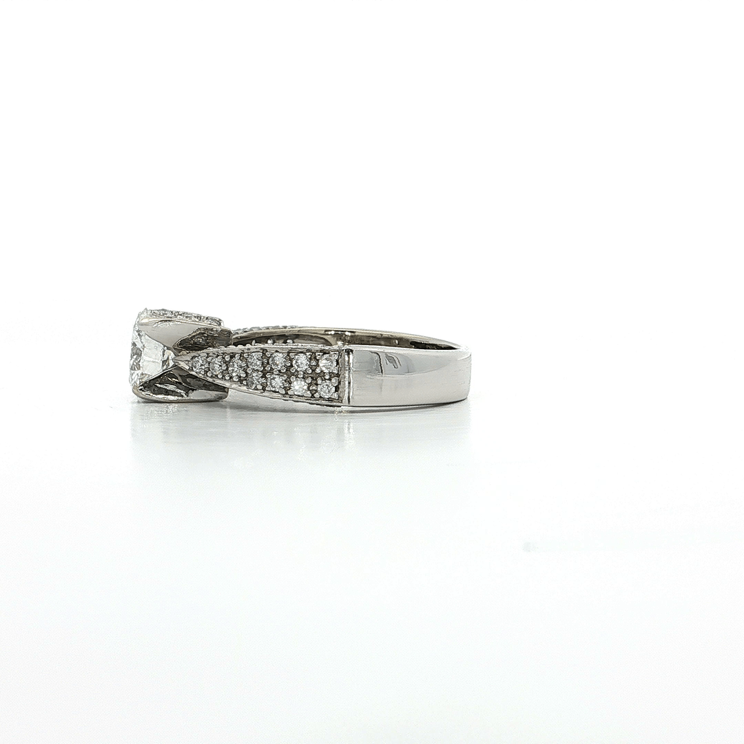 1.25 CTW Colorless Round Brilliant Diamond Engagement Ring in Pavé Mounting 14kt White Gold