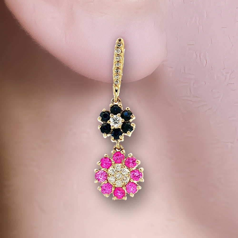 Vivid Blue Sapphire, Vivid Pink Sapphire & Diamond Floral Dangle Earrings (2 ⅔ ct. tw.) in 14k Yellow Gold shown on the ear (light skin tone)