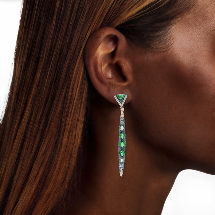 Vivid Tsavorite Green Garnet & Nearly Flawless Colorless Diamond Gradient Dangle Earrings (5 ⅖ ct. tw.) in 18k Yellow Gold shown on the ear (deep skin tone)