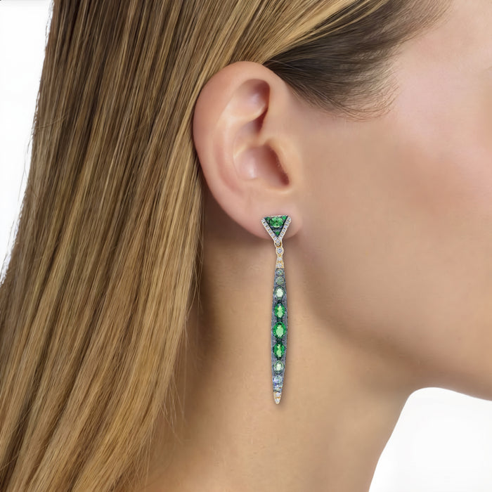 Vivid Tsavorite Green Garnet & Nearly Flawless Colorless Diamond Gradient Dangle Earrings (5 ⅖ ct. tw.) in 18k Yellow Gold shown on the ear (light medium skin tone)