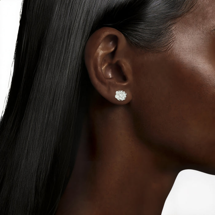 Flower Cluster Colorless Diamond Stud Earrings (1 ct. tw.) in 14k White Gold shown on the ear (deepest skin tone)
