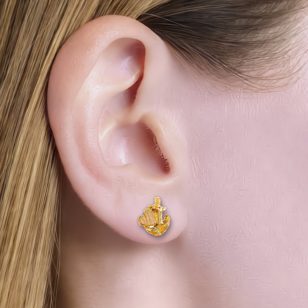Cross, Heart & Anchor Stud Earrings in 14k Yellow Gold shown on the ear (light skin tone)