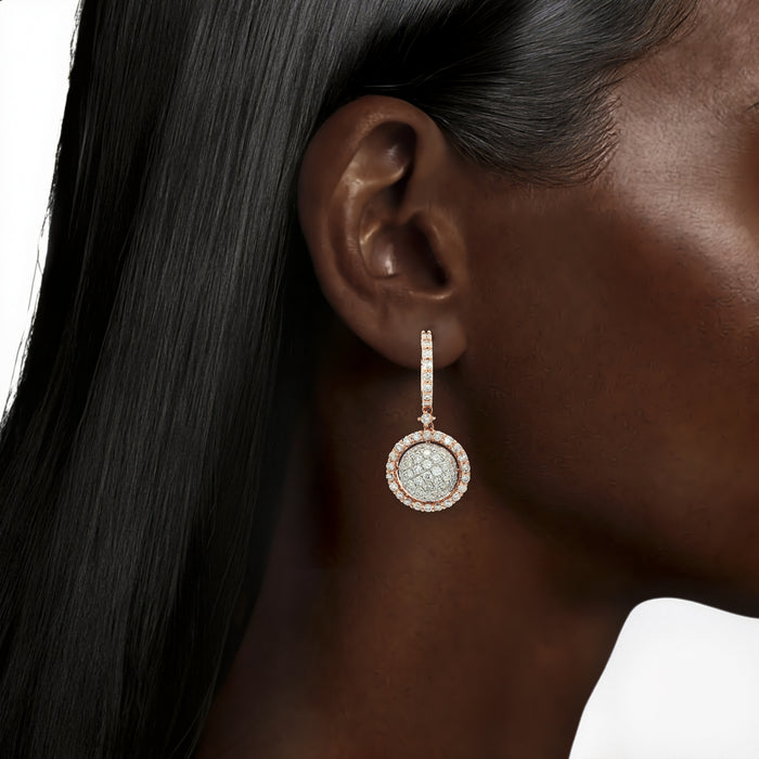 Near Colorless Diamond Globe Drop Earrings (2 ⅘ ct. tw.) in 14k Rose Gold shown on the ear (deepest skin tone)